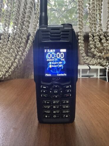 klaviatura hp: Antenalı qara rəngli uzaqdan danışıq cihazı. Cihazın ekranında "SQ7"