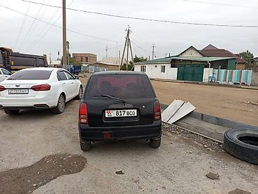 Daihatsu: Daihatsu Cuore: 2001 г., 1 л, Механика, Бензин, Купе — 2