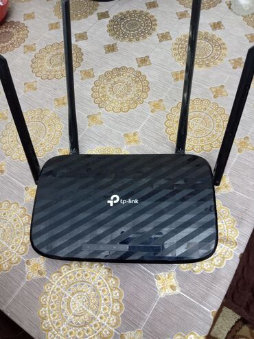 Skanerlər: TP-Link Wi‑Fi router - Brend/model: TP‑Link (qara, zolaqlı korpus), 4