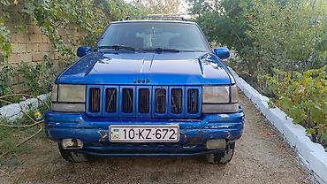 Jeep: Jeep Grand Cherokee (ZJ) – mavi rəngli, 5 qapılı SUV - Mühərrik: V8 — 1