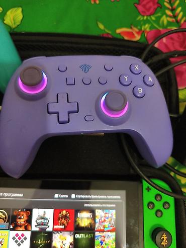 Nintendo Switch: Прошитый Нинтендо свич, есть недастатка маленькая царапина, левый — 3