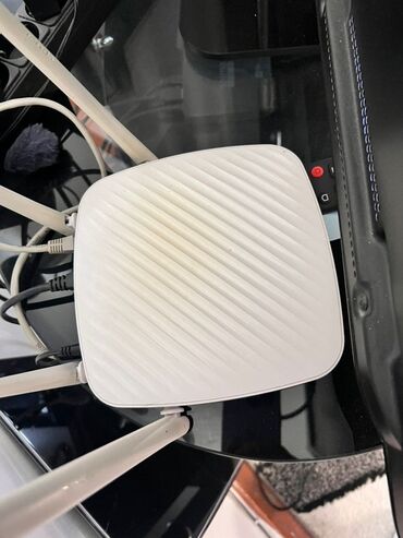 модемы купить: Беспроводной маршрутизатор Tenda AC2100 белого цвета с поддержкой двух