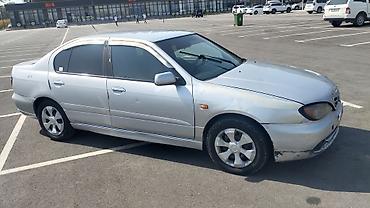 r13 17570: Nissan Primera: 2000 г., 2 л, Механика, Бензин, Седан — 6