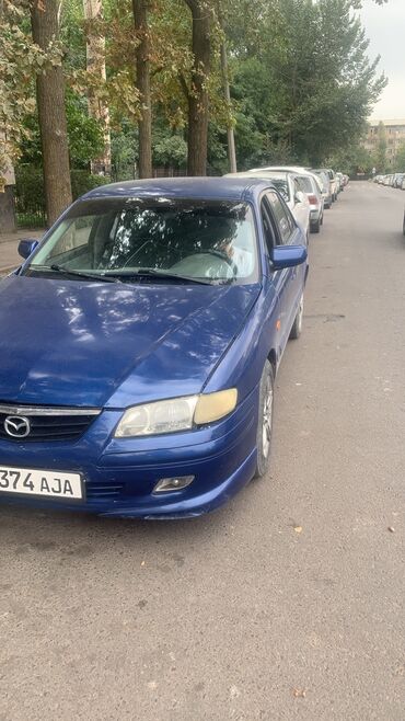 посадка машины: Mazda 626: 2000 г., 2 л, Механика, Газ, Седан