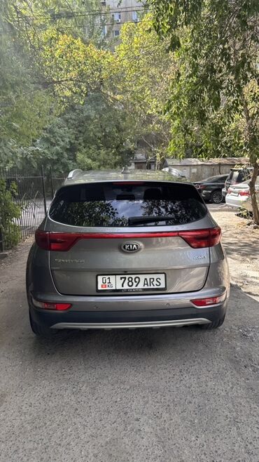 киа спорттеж: Kia Sportage, поколение QL, кроссовер 4WD. Цвет: серый металлик