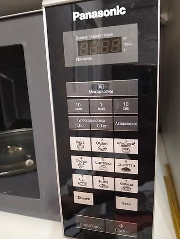 Mikrodalğalı sobalar: Mikrodalğalı soba Panasonic, Ayrıca dayanan, Mikrodalğalar ilə, rəng - Gümüşü, İşlənmiş — 2