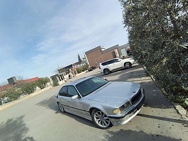 bmw f10 lip: BMW 7 Series sedan (E38), gümüş rəngli, 4 qapılı, arxa ötürücülü — 1