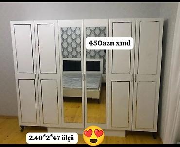 Ağ rəngdə 6 qapılı böyük paltar şkafı. Orta hissədə 2 ədəd tam ölçülü lalafo.az -da Ağ rəngdə 6 qapılı böyük paltar şkafı. Orta hissədə 2 ədəd tam ölçülü