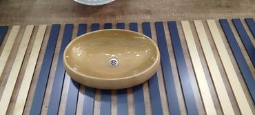 Kabrolar: - Üstəqoyma əl yuma qabı (vanna otağı üçün lavabo) - Oval forma, dərin