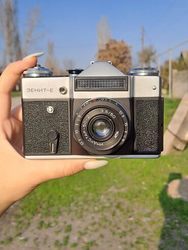 Фото и видеокамеры: Раритетный фотоаппарат Зенит-Е 1984 года выпуска. Новый. Все что есть