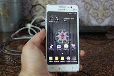 a 20 s: Samsung Galaxy Grand, 16 ГБ, цвет - Белый, Кнопочный, Сенсорный, Отпечаток пальца