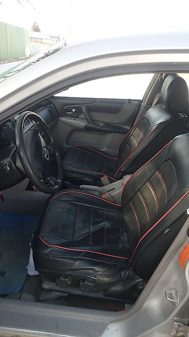 Mazda: Mazda 323: 2002 г., 1.6 л, Механика, Бензин, Универсал — 7