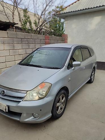 хонда стрим 2005: Honda Stream: 2004 г., 1.7 л, Автомат, Универсал — 1