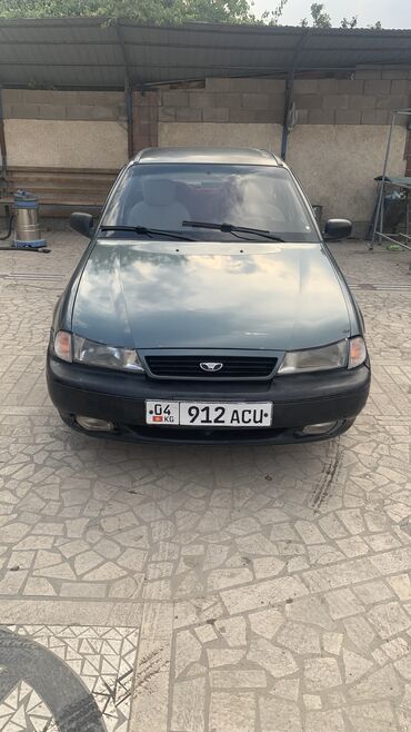 рассрочкага машина берем: Daewoo Nexia: 1997 г., 1.5 л, Механика, Бензин, Седан