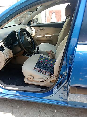 balaca maşın: Kia Rio: 1.4 l | 2008 il Hetçbek — 7