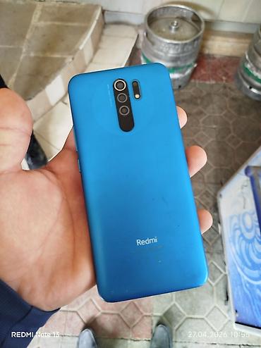 islenmis plansetlerin satisi: Xiaomi Mi 9, 32 GB, rəng - Göy, 
 Barmaq izi — 5
