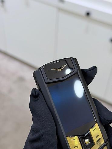 qizil nomreler: Vertu 4 GB, rəng - Qızılı, Düyməli — 8
