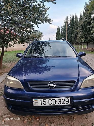 Продажа авто: Opel Astra Caravan (universal), mavi rəng. - Kuzov: universal, dam — 3