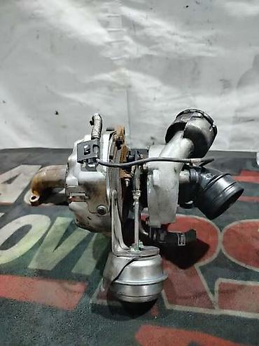 Delovi motora: TURBINA SA IZDUVNOM GRANOM ZA VOLKSWAGEN PASSAT B6 OD 2005. DO 2010 — 1