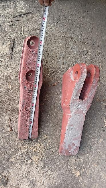 Запчасти для строительных машин: Коронка/зуб ковша экскаватора (напрессной/под штифт), комплект из 2 — 7