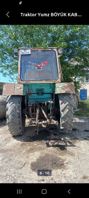 Traktorlar: YUMZ traktor – böyük kabinalı model Xüsusiyyətlər: - Dizel mühərrik — 9