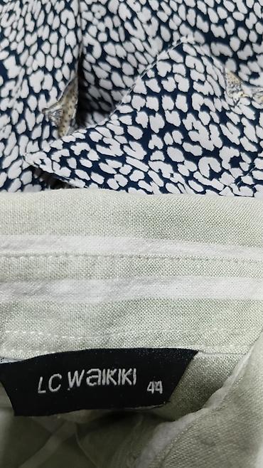 Košulje: Set od 4 ženske košulje na dugmad, različitih dezena i krojeva: - — 9