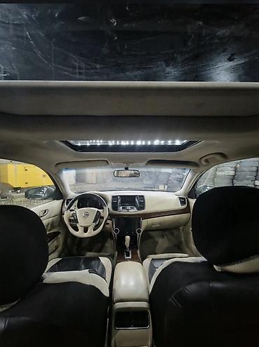 nissan wingroad: Nissan Teana – biznes sinfi sedan Xüsusiyyətlər: - Korpus: qara rəng — 10
