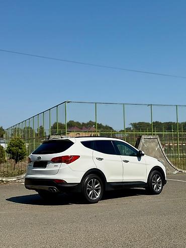 musiqili sükan: Hyundai Santa Fe (3-cü nəsil) – ağ rəngli, şəhər və uzun yol üçün — 3