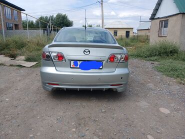 запчасти тойота королла бишкек: Представленный автомобиль - это седан Mazda 6 серебристого цвета