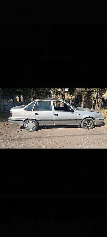 матасыкыл зид: Daewoo Nexia: 2005 г., Кол менен иштөөчү, Бензин, Седан — 4