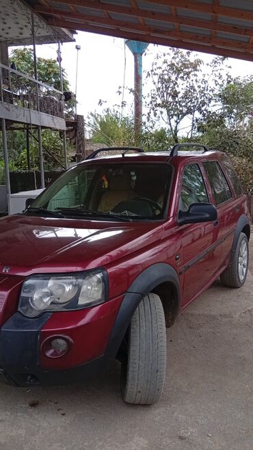 Land Rover: Land Rover Freelander, tünd qırmızı rəngli, 5 qapılı SUV