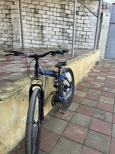 işlenmiş velosiped: Dağ velosipedi – 29təkər, disk əyləcli - Korpus: yüngül alaşımlı — 1
