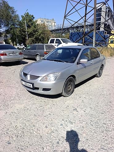 e34 2 5: Mitsubishi Lancer: 2002 г., 1.6 л, Автомат, Газ, Седан — 2
