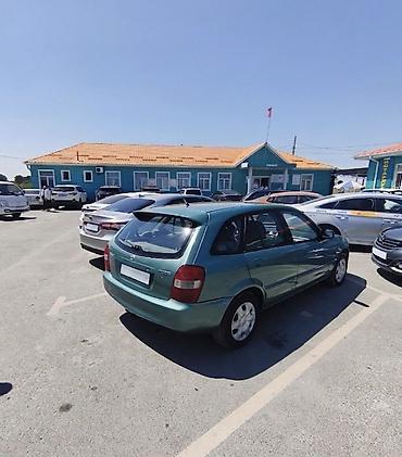 мтз 92 п: Mazda Familia: 2001 г., 1.6 л, Автомат, Бензин, Хэтчбэк — 4