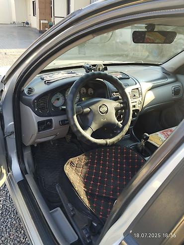 механическая: Nissan Almera: 2002 г., 1.8 л, Механика, Бензин, Хэтчбэк — 1