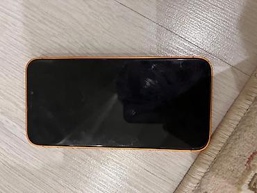 Другие мобильные телефоны: Смартфон с ярким оранжевым корпусом и плоскими гранями. Корпус из — 5