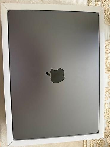 macbook pro m3: MacBook Pro m3 yenikidi 5 defe kinoya baxilib ustunde orginal adapdir — 1