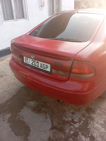 продам кару: Mazda Cronos: 1992 г., 2 л, Механика, Бензин, Хэтчбэк — 5