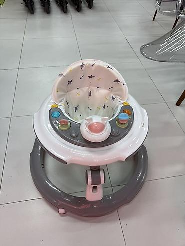 Детские ходунки с игровым столиком - Круглая устойчивая база на at lalafo.kg Детские ходунки с игровым столиком - Круглая устойчивая база на