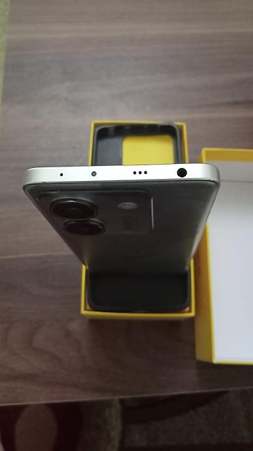11 telefon: Poco M7 Pro 5G, 256 GB, rəng - Gümüşü, Face ID, Barmaq izi — 5