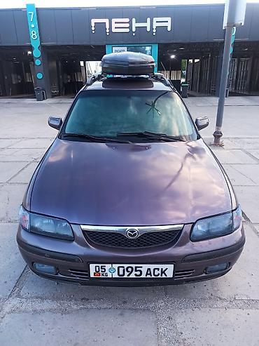385 55: Mazda 626: 1999 г., 1.8 л, Механика, Бензин, Универсал — 1