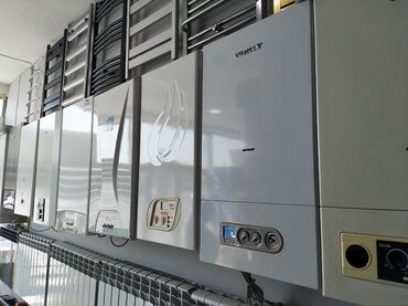 istilik sistemləri: Divarda quraşdırılmış qaz kombiləri, müxtəlif markalar və dizaynlar