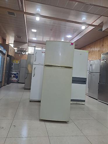 İki qapılı soyuducu (yuxarıda dondurucu, aşağıda soyuducu bölmə)
