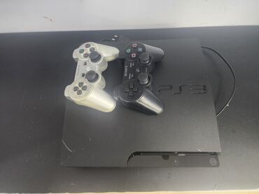 купить чехол для ноутбука 15.6: Sony PlayStation 3 Slim + 2 беспроводных геймпада DualShock 3 at lalafo.kg купить чехол для ноутбука 15.6: Sony PlayStation 3 Slim + 2 беспроводных геймпада DualShock 3