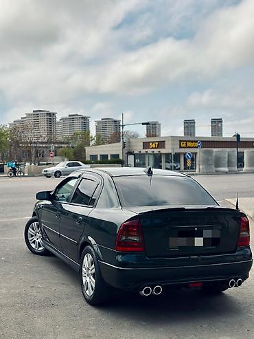bmw e 38: Opel Astra: 1.6 l | 1999 il 400 km Sedan — 9