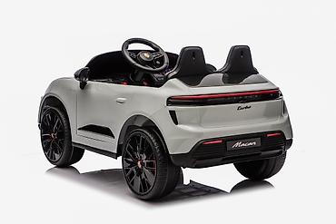 stitch rančevi: **Auto na baterije PORSCHE MACAN SUV licencirani – sivi** **Šifra — 1