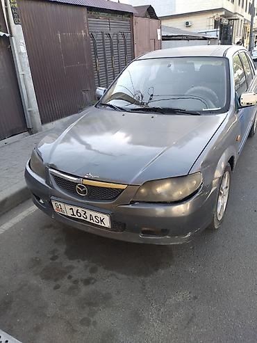 mazda 2000: Mazda 323: 2002 г., 1.6 л, Механика, Бензин, Универсал — 4