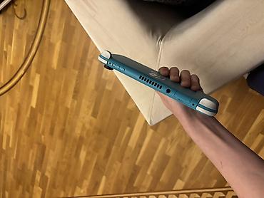 nintendo switch 3 lite: Nintendo Switch Lite – türkuaz rəngdə portativ oyun konsolu — 3