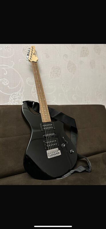 QAZ: Gitara demək olar istifadə olunmayıb. Səliqəli haldadır 600 azn