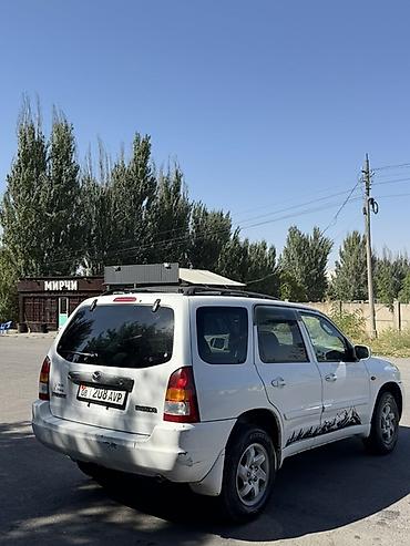 диск на фуру: Mazda Tribute: 2002 г., 2 л, Автомат, Газ, Кроссовер — 5